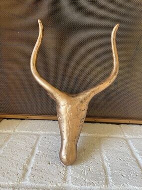 Wall mounted antelope/gazelle head sculpture.